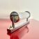 Functionalist wall lamp with glass tube shade, Czechoslovakia, 1950s