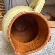 Earthenware jug/carafe HB with grape bunch slip decoration.