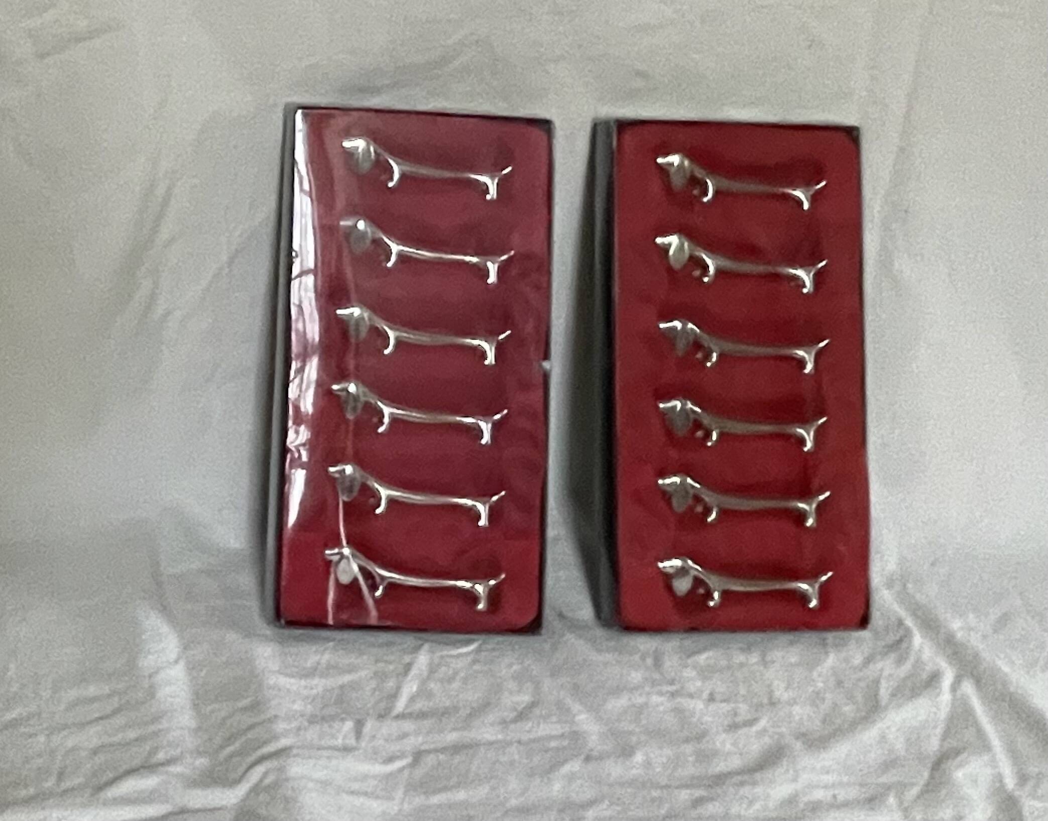 Silver dachshund knife holder