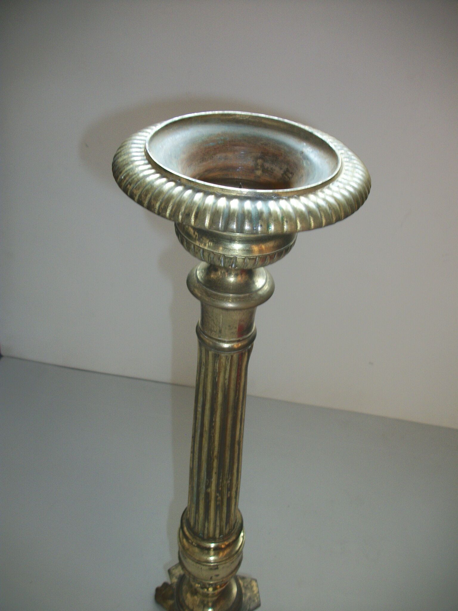 Brass church candle pique