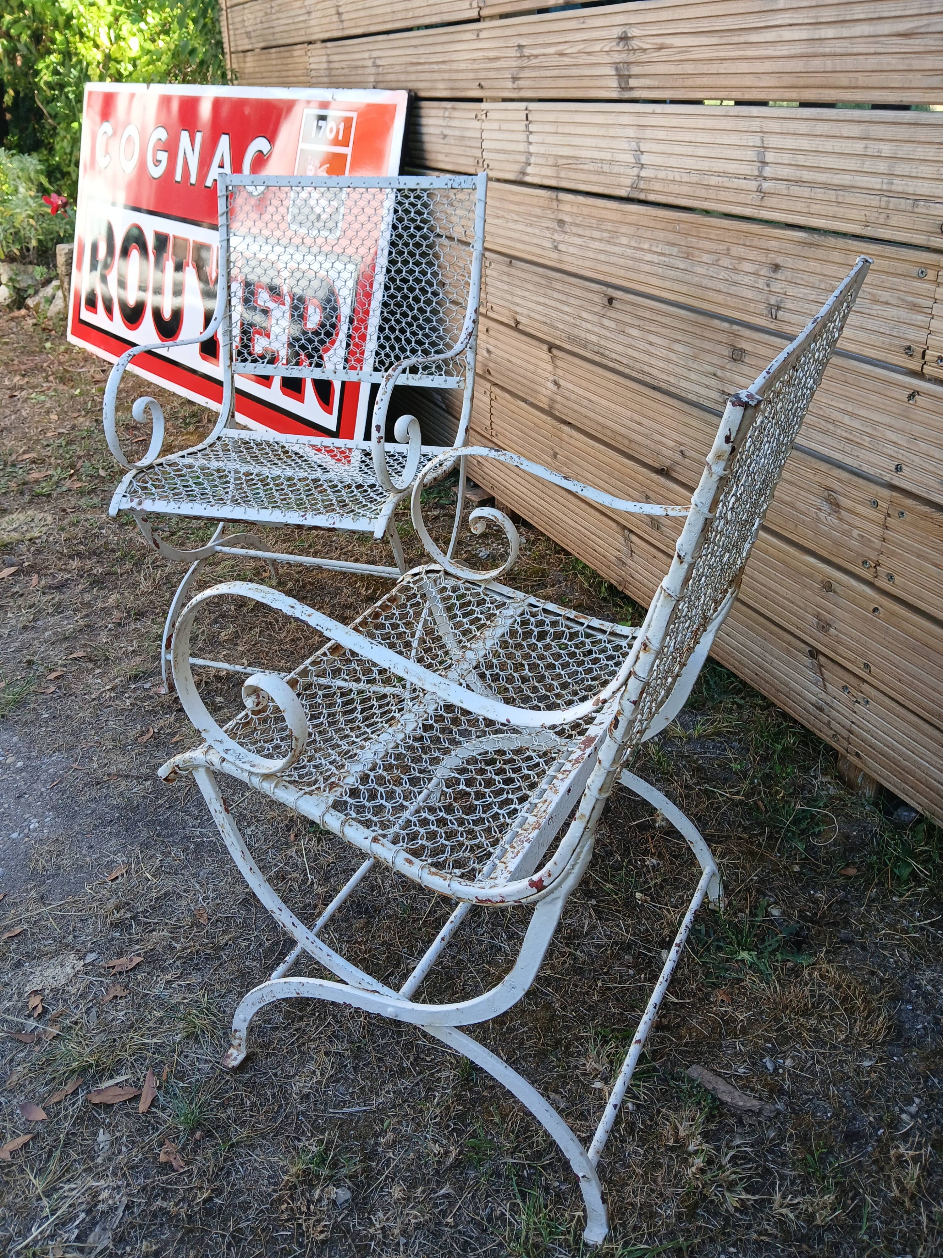 Pair of early 20th century metal garden armchairs