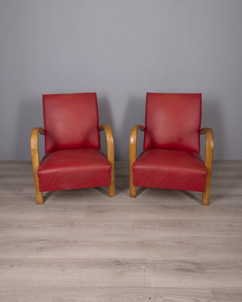 Pair of vintage 1950's armchairs in red leather, italian design