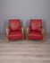Pair of vintage 1950's armchairs in red leather, italian design