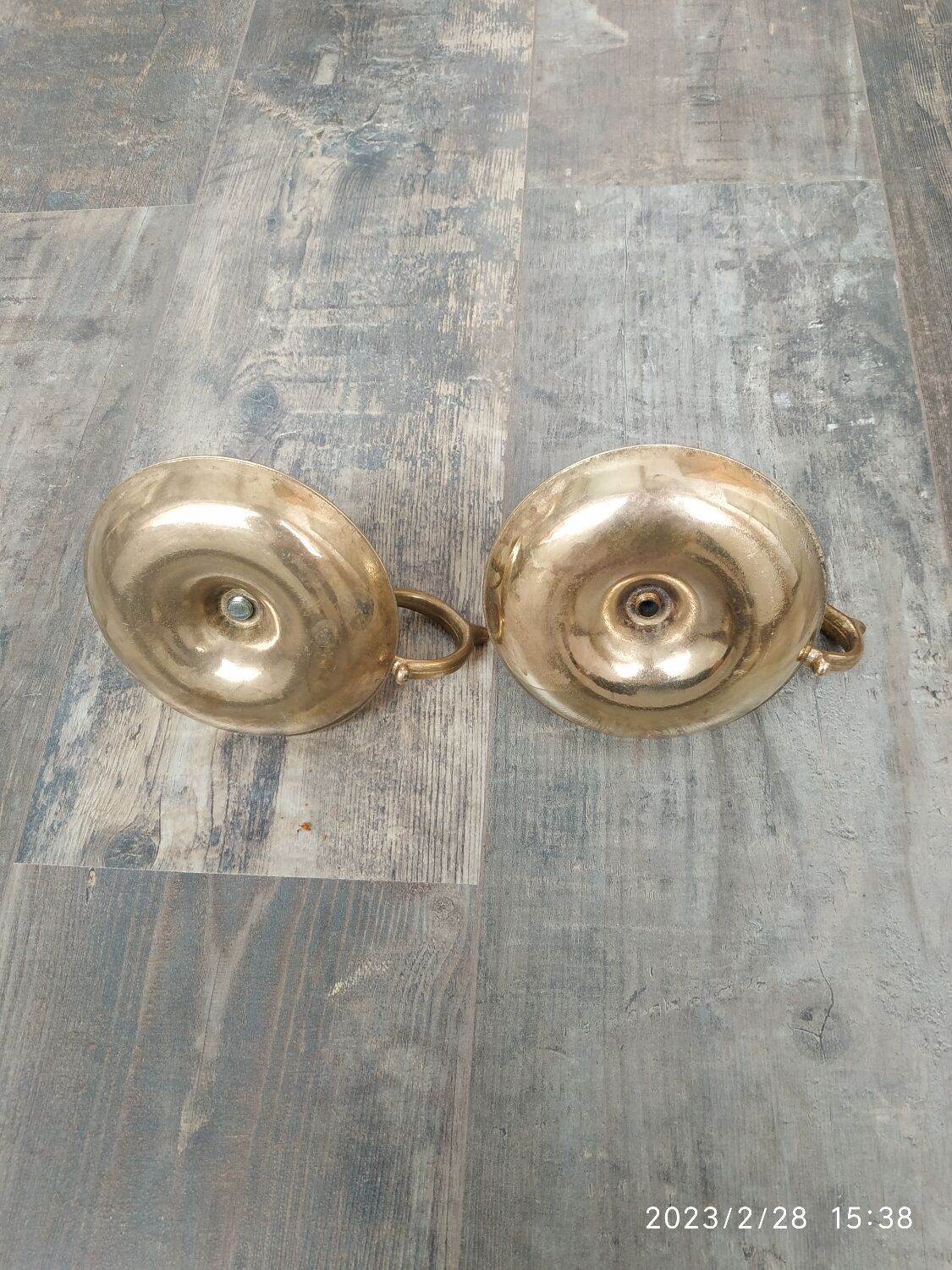 Duo of brass candle holders