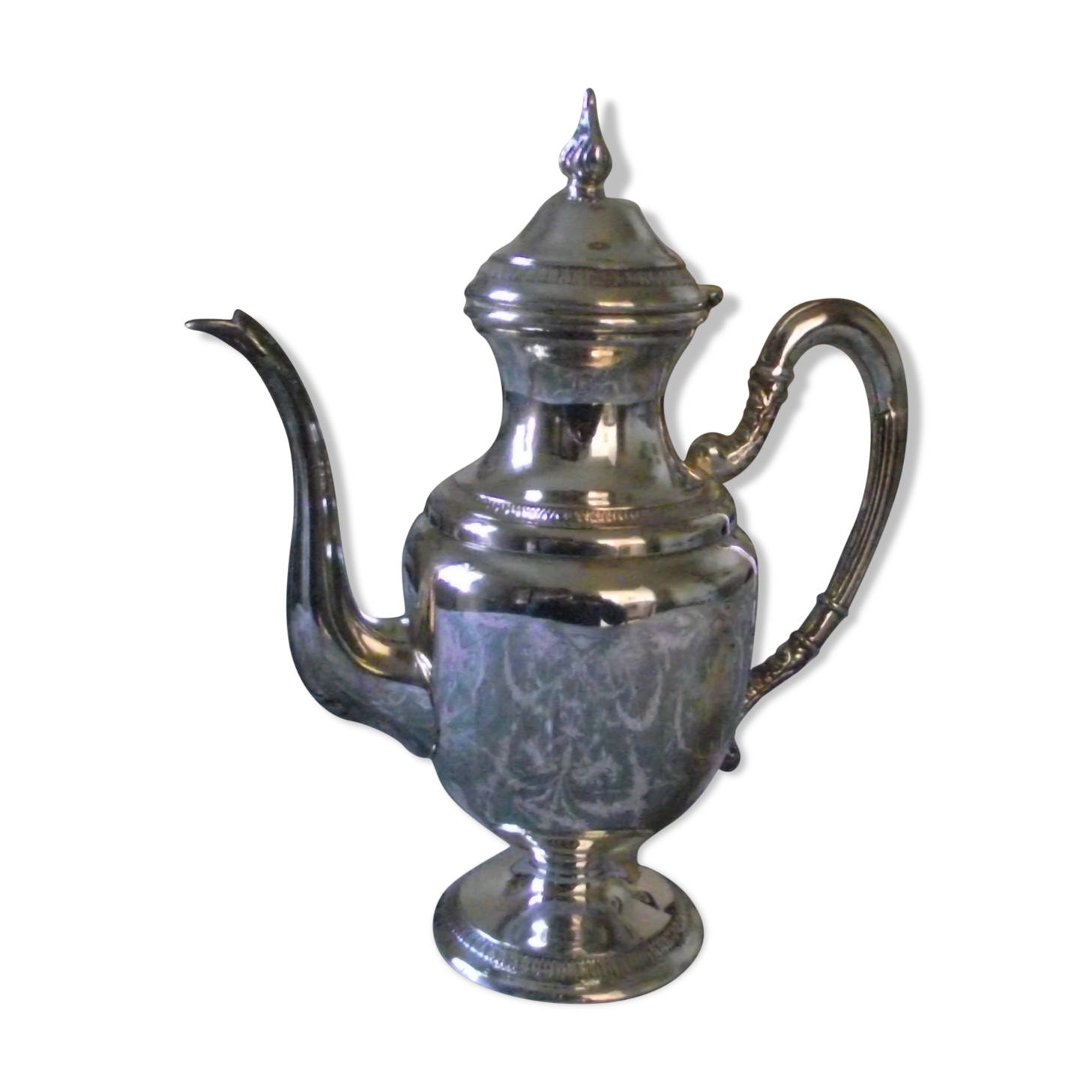 Empire-style silver metal teapot.