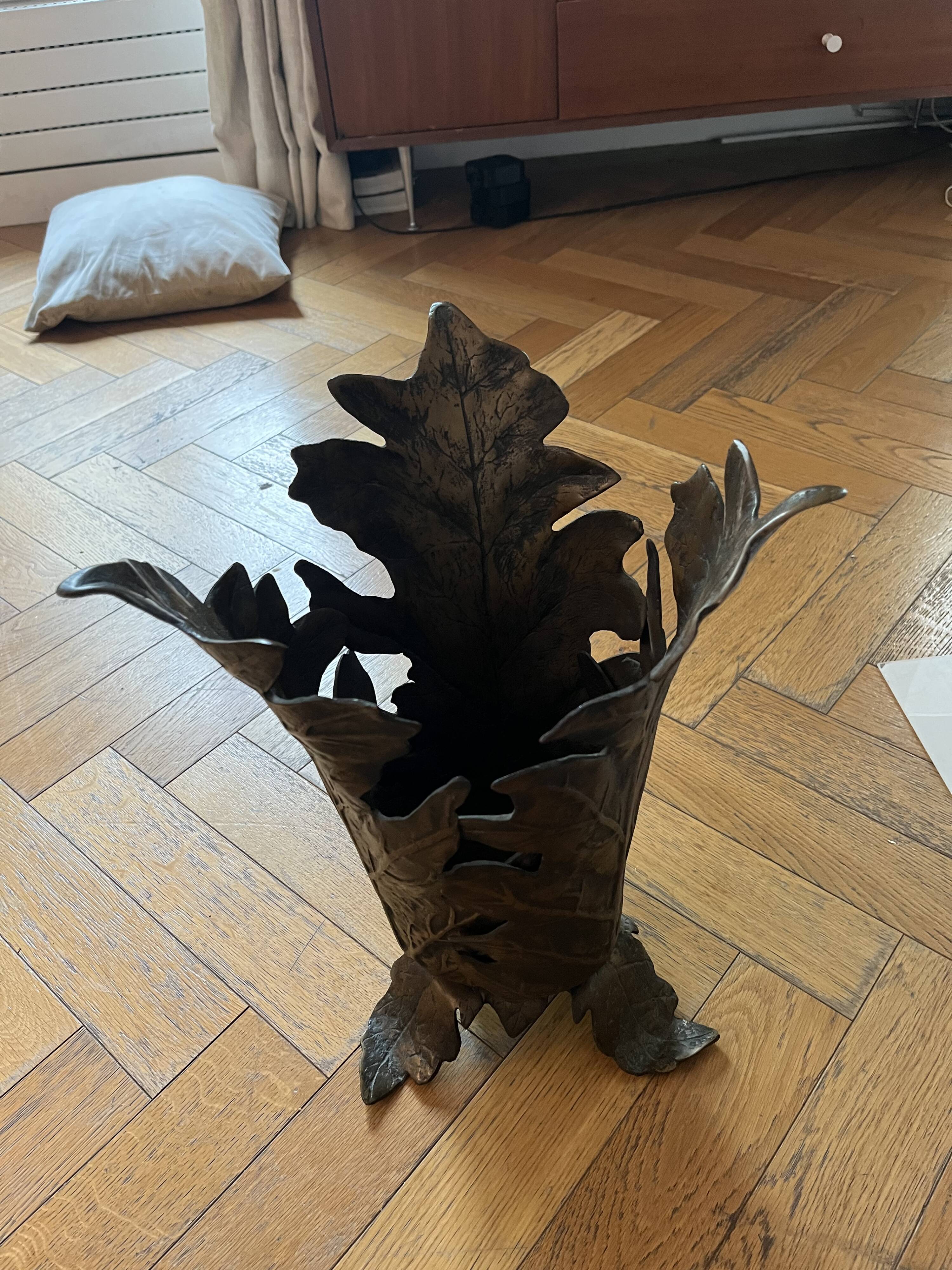 Elegant bronze umbrella door by the famous Italian designer Gabriella Crespi