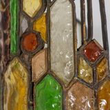 Applique en fer forgé et en verre coloré. Années 1960.