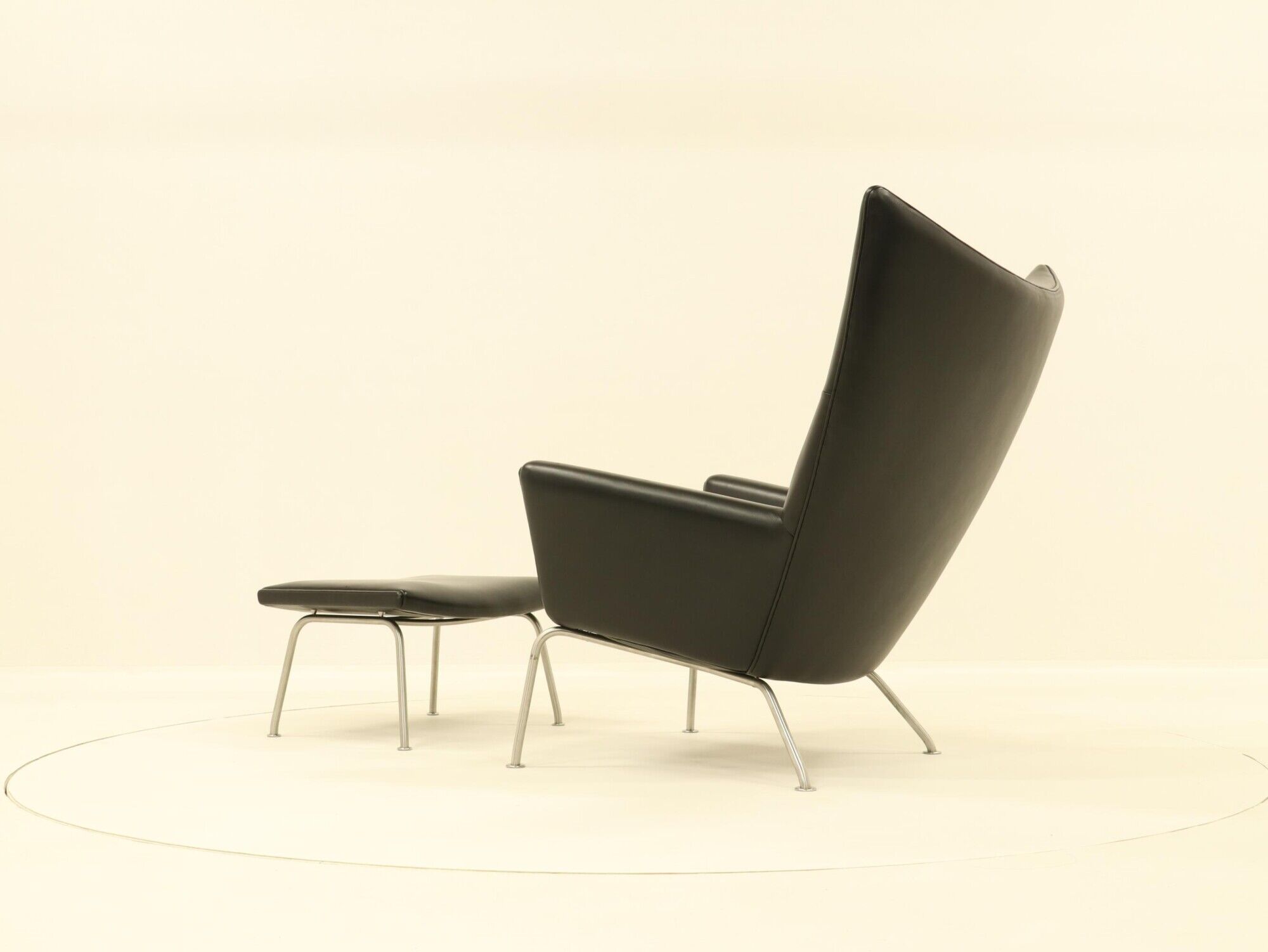 Wing chair & matching ottoman – CH445 & CH446 – by Hans Wegner