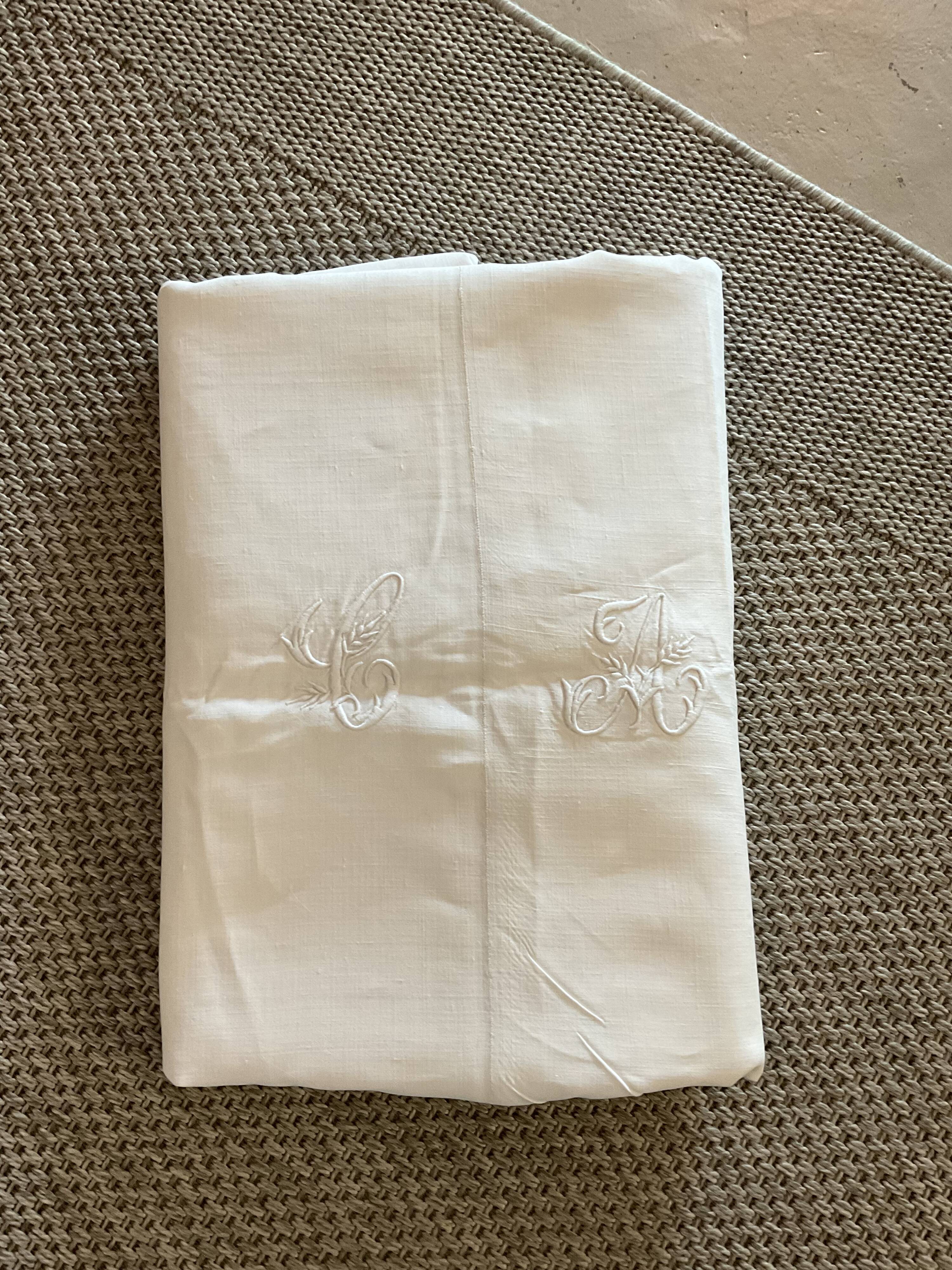 Old sheet .embroidered.monogram .CA