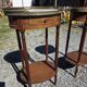 Pair of Louis XVI style bedside tables in mahogany, with marble tops.