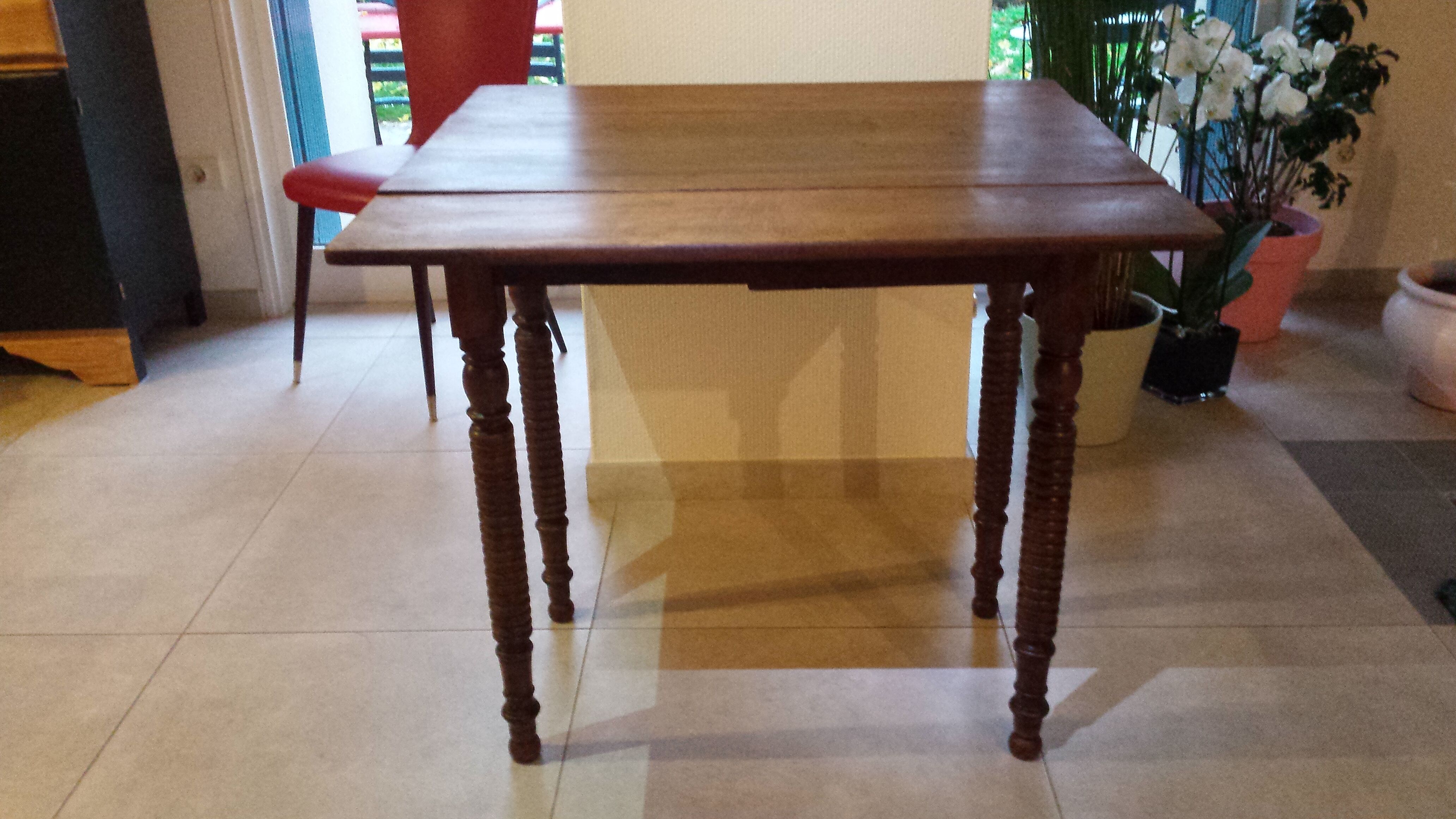 Wooden table with extensions