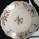 Paire d'assiettes en faïence à motif à décor de fleurs champêtre