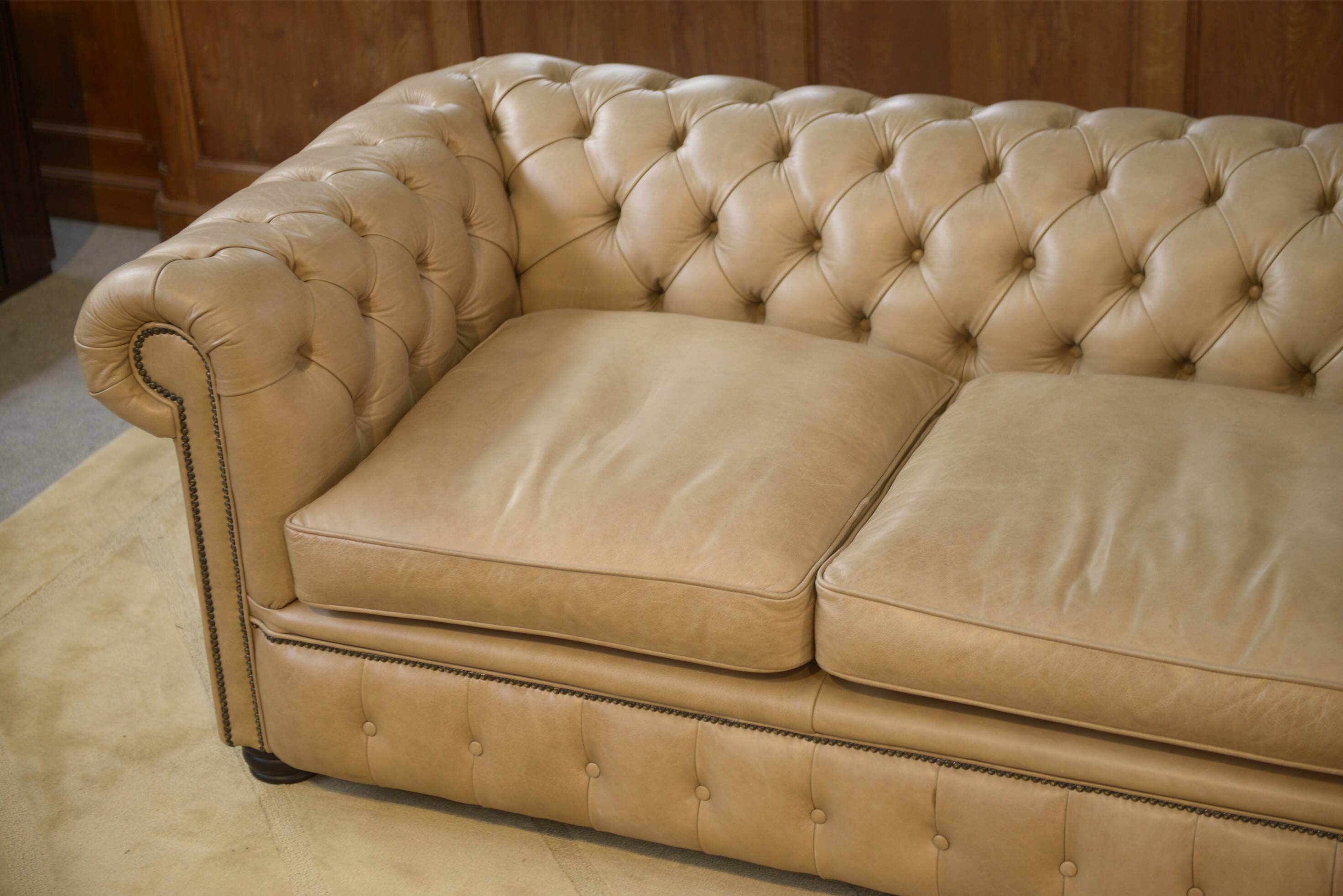 Beige leather Chesterfield sofa handmade in England.