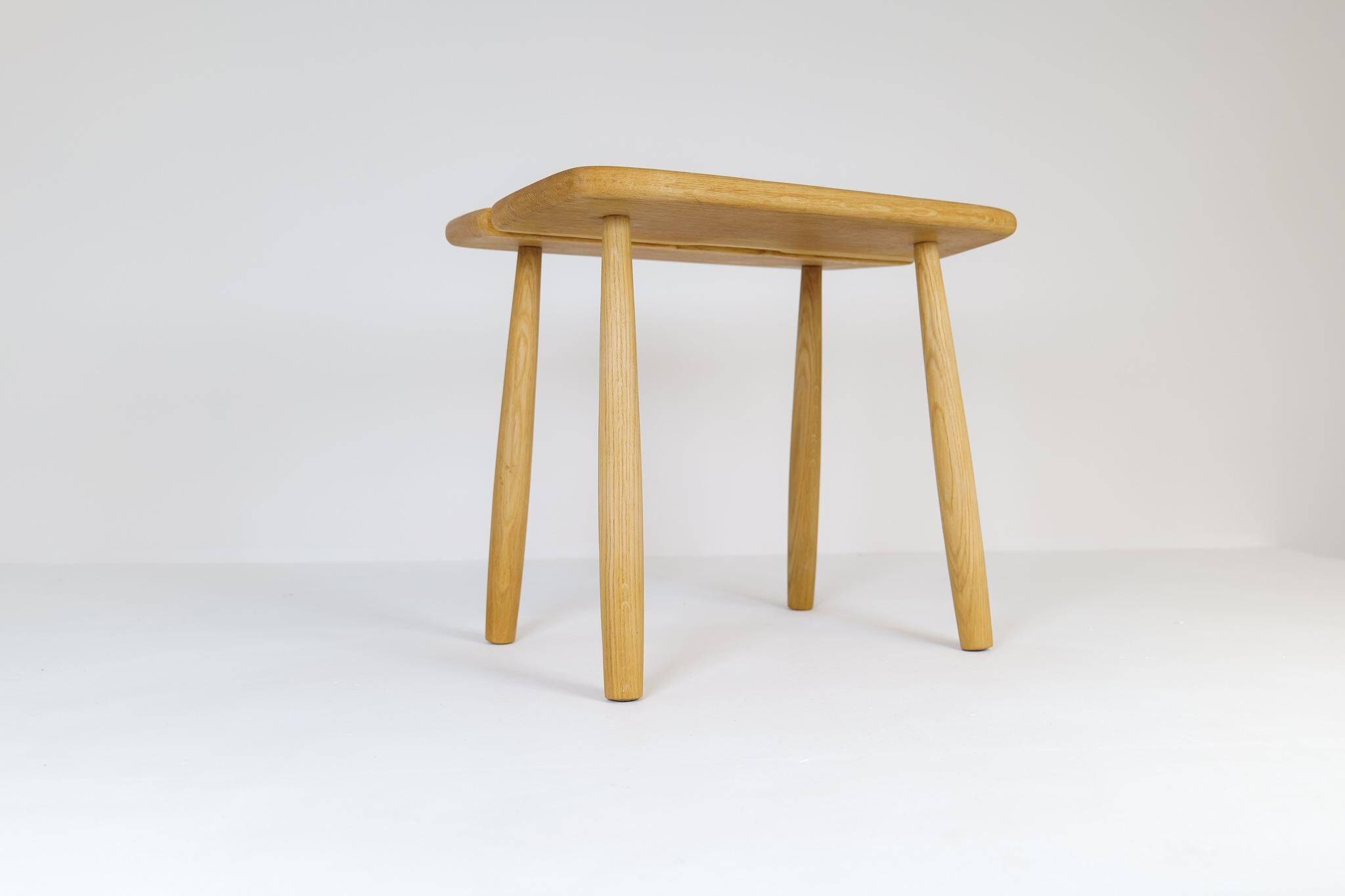 Sculptural mid-century stool in solid oak by Carl Gustaf Boulogner, Sweden, 1950s.