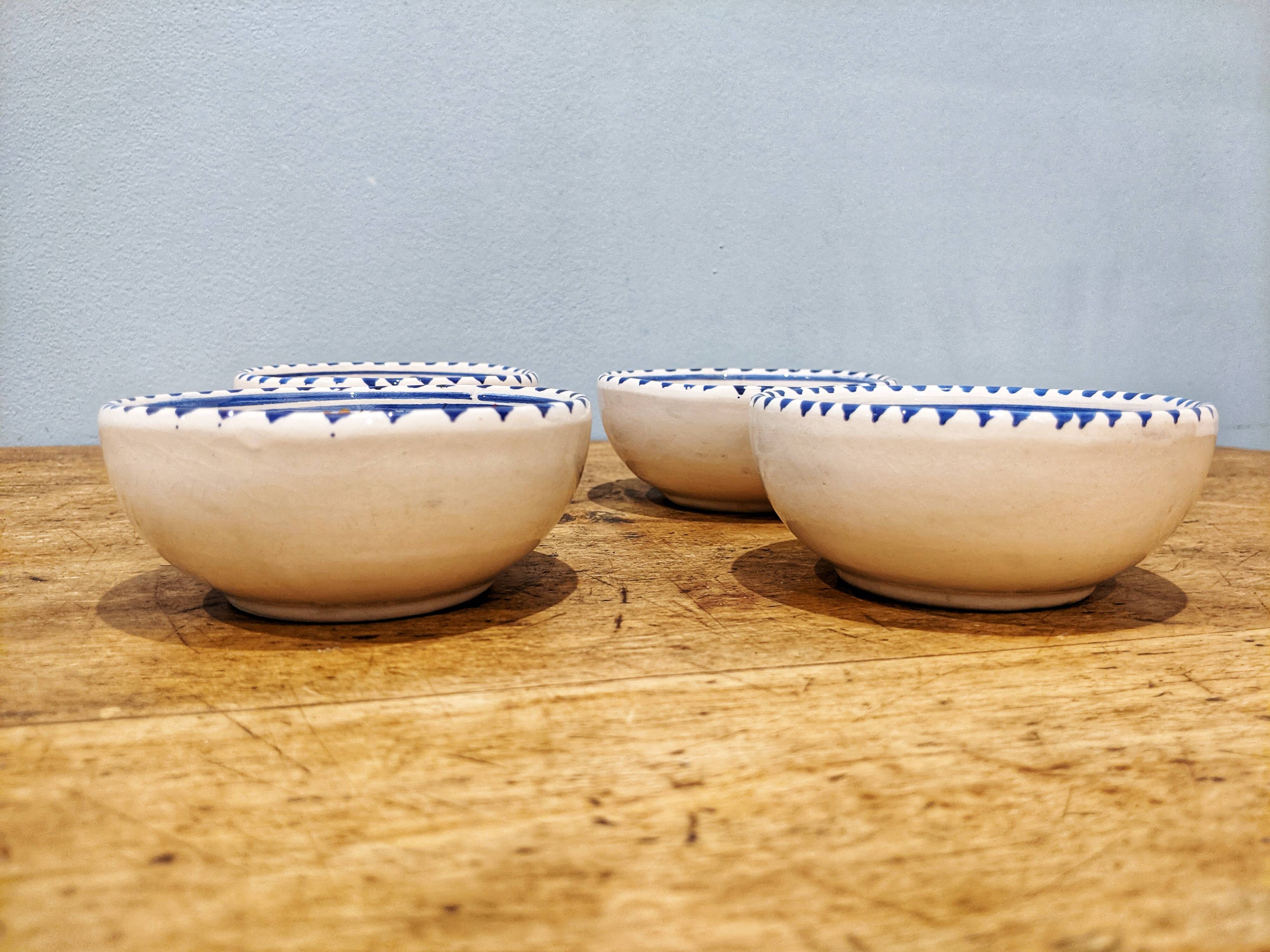 4 hand-painted ceramic cups