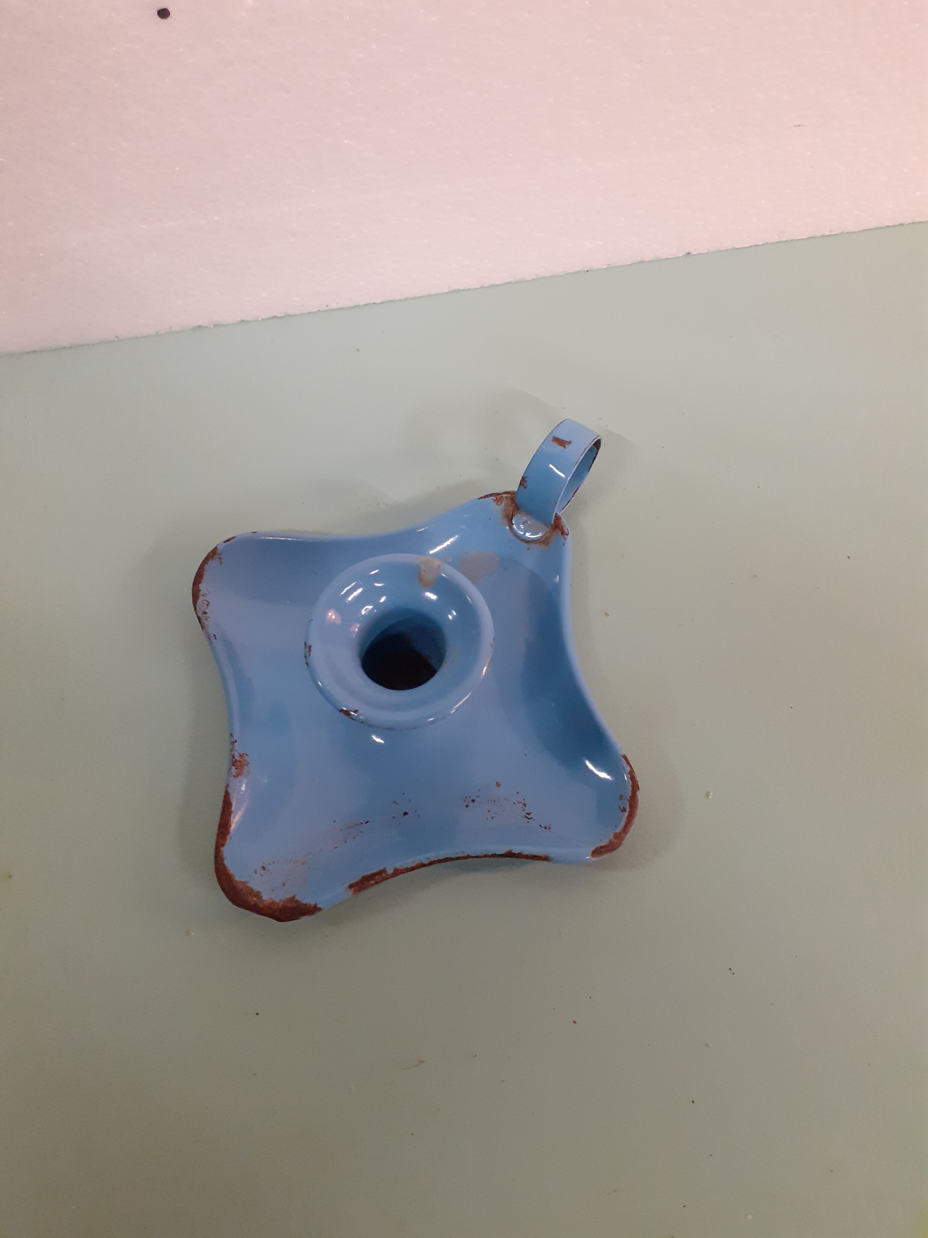 Enamelled sheet metal candlestick