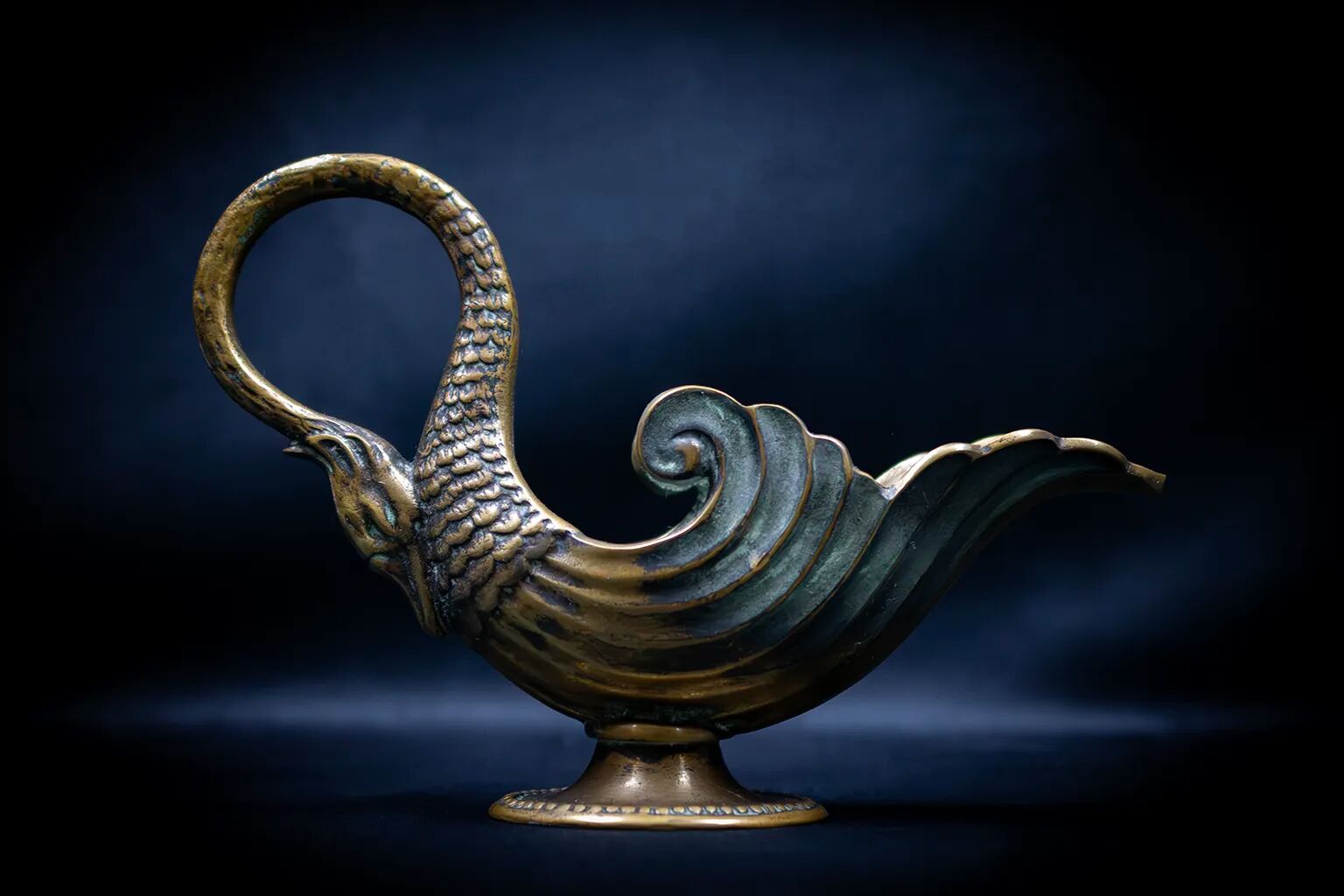 Bronze patinated pocket emptier with swan decoration by Max Le Verrier.