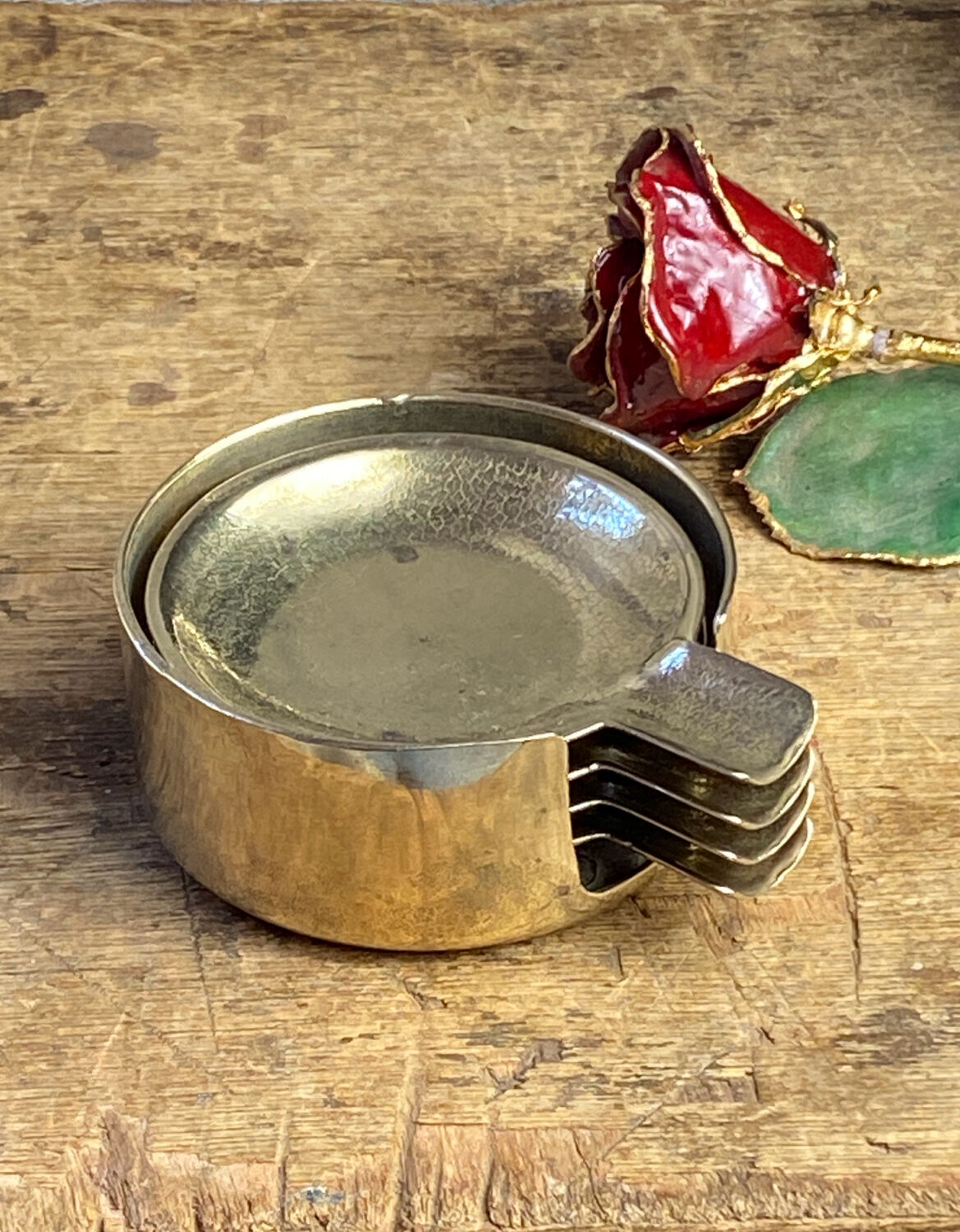Individual brass ashtrays with storage support