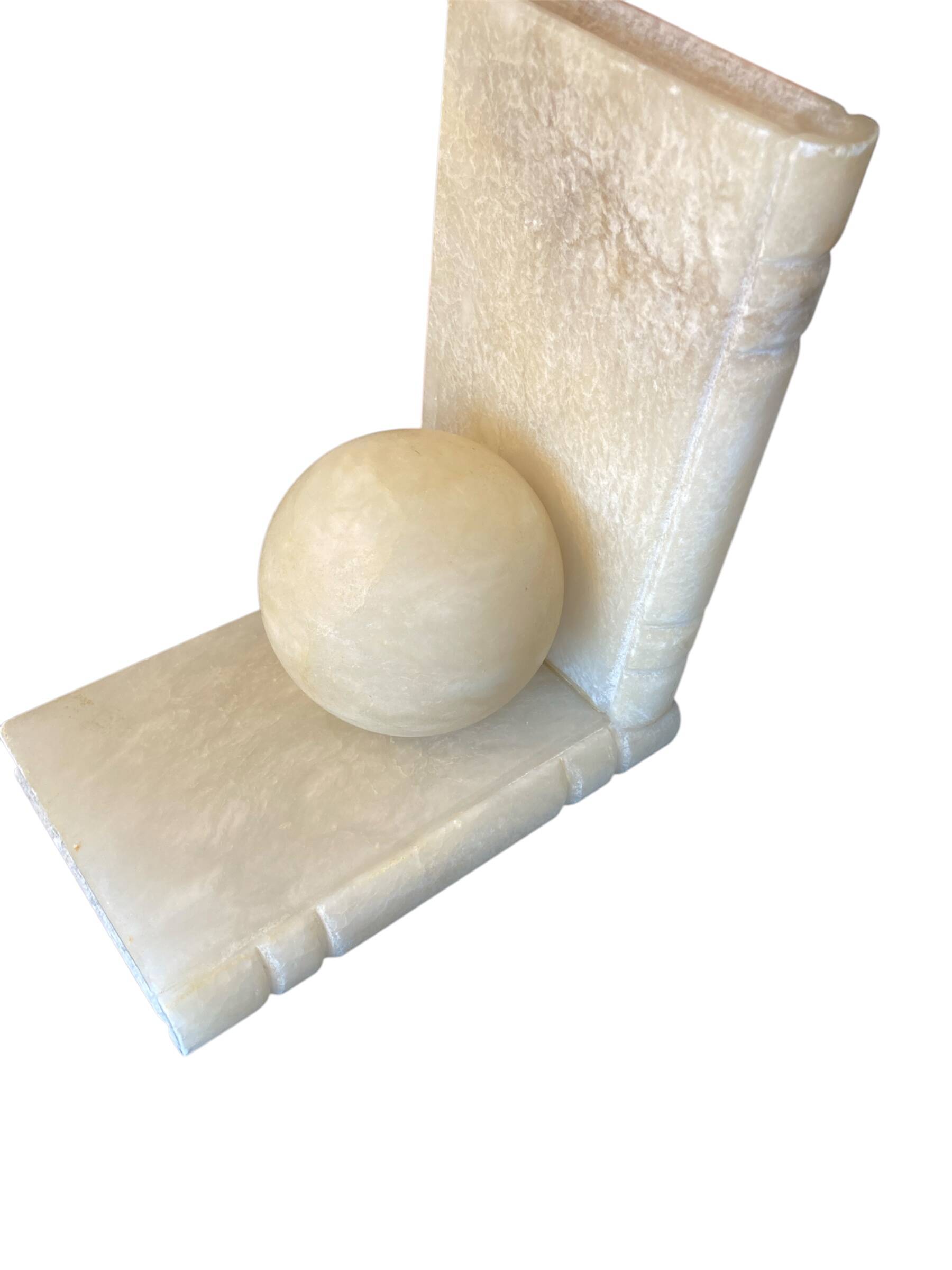 Paire de serres livres, Albâtre, Période Années 1930