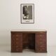 Small vintage stained wooden countertop with 2 shelves and 10 drawers