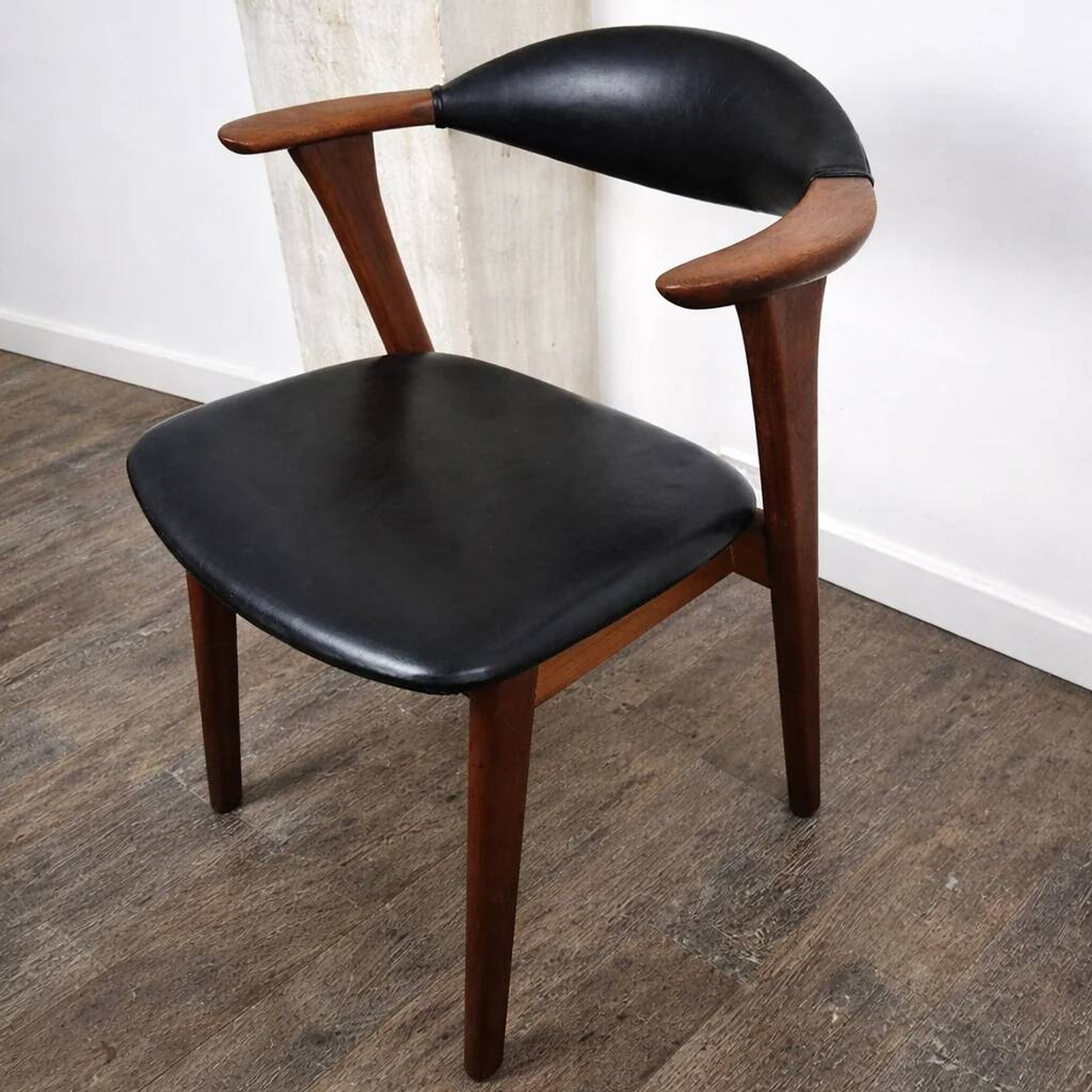 Teak chair with faux leather, model 49 by Erik Kirkegaard for Høng Møbelfabrik, Denmark, 1960.