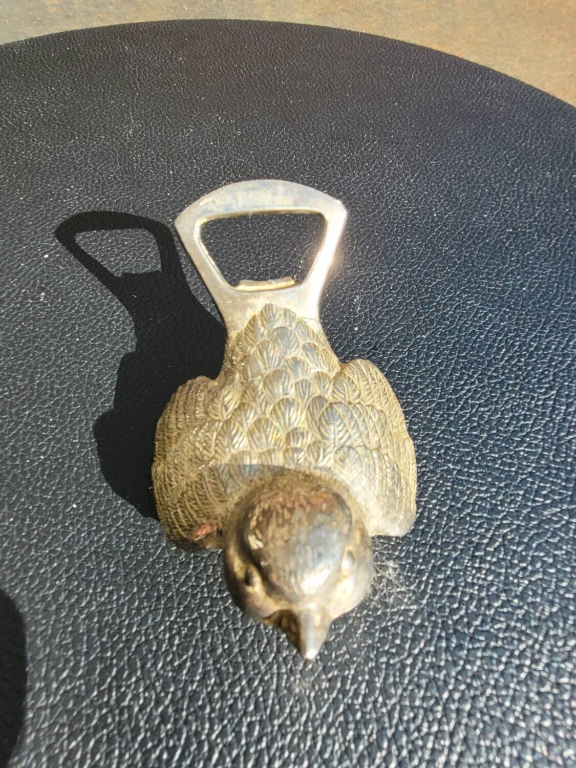 Vintage bird bottle opener