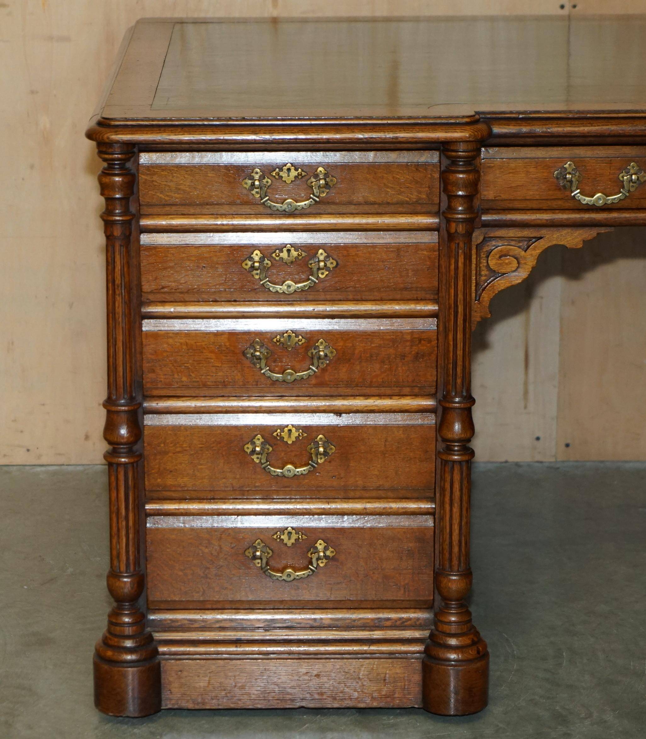 Antique double-sided desk C Hindley & Son in oak and leather