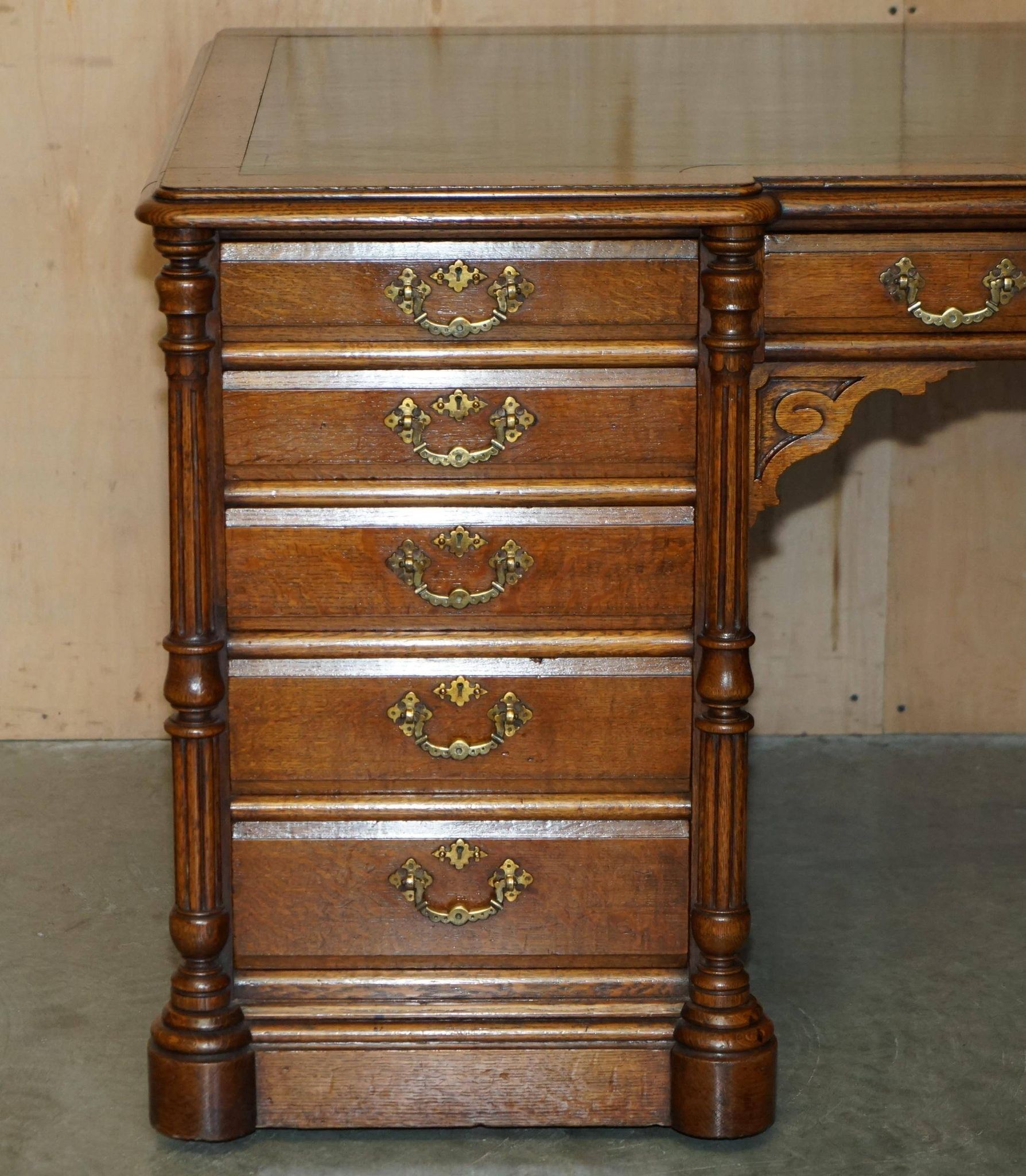 Antique double-sided desk C Hindley & Son in oak and leather