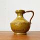 Italian pottery carafe from the mid-century by Aldo Londi for Bitossi, 1960s.