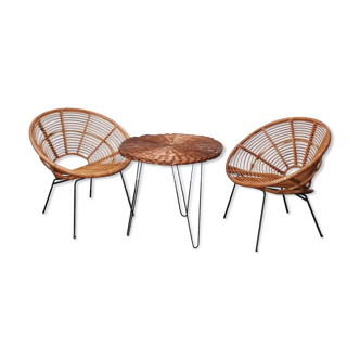 Set of armchairs "soleil" and rattan table of the years 50