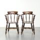 Set of two wooden English antique captain chairs from the late 19th century