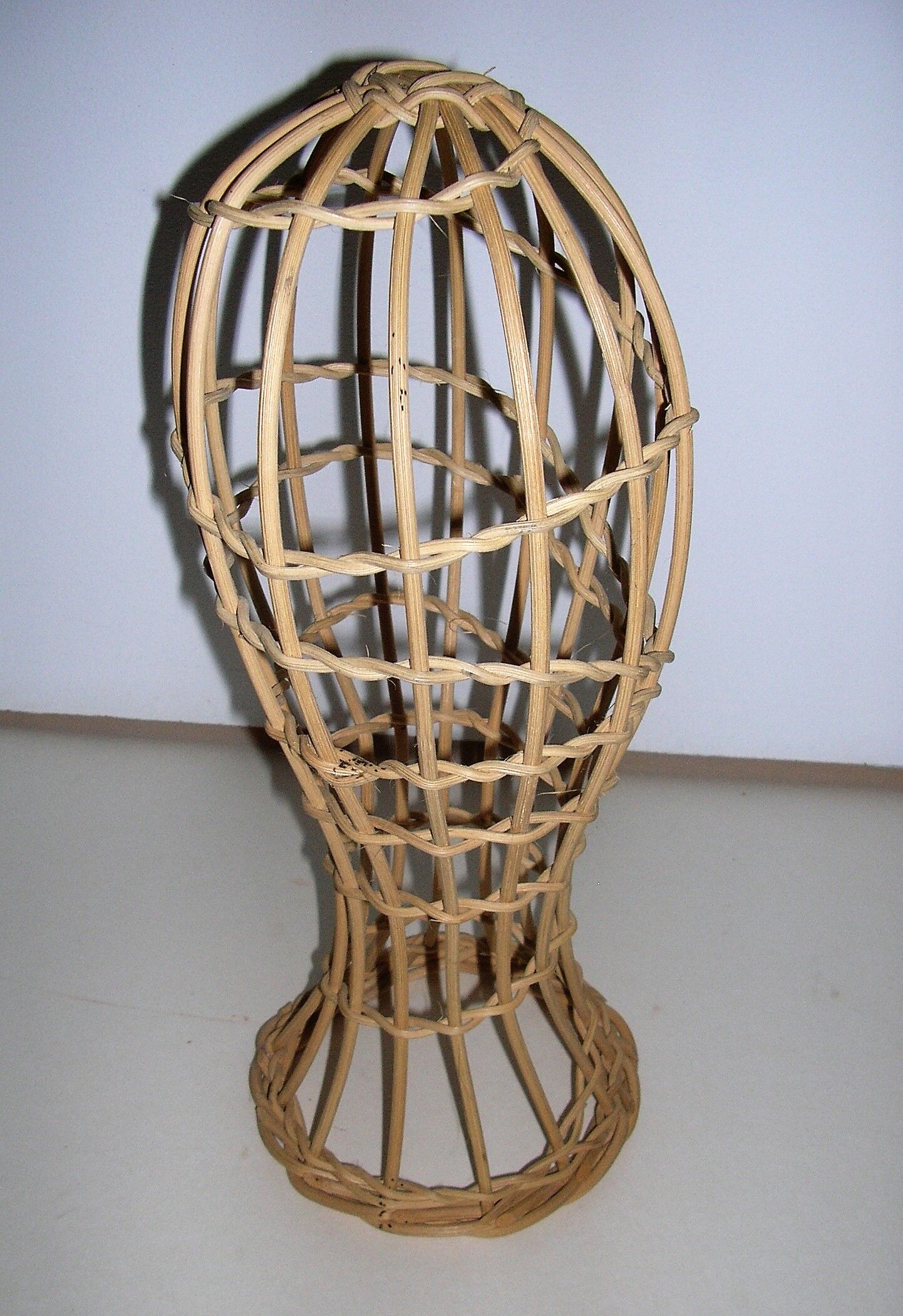 Model head in rattan