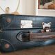Old blue suitcase the lamp of France radio