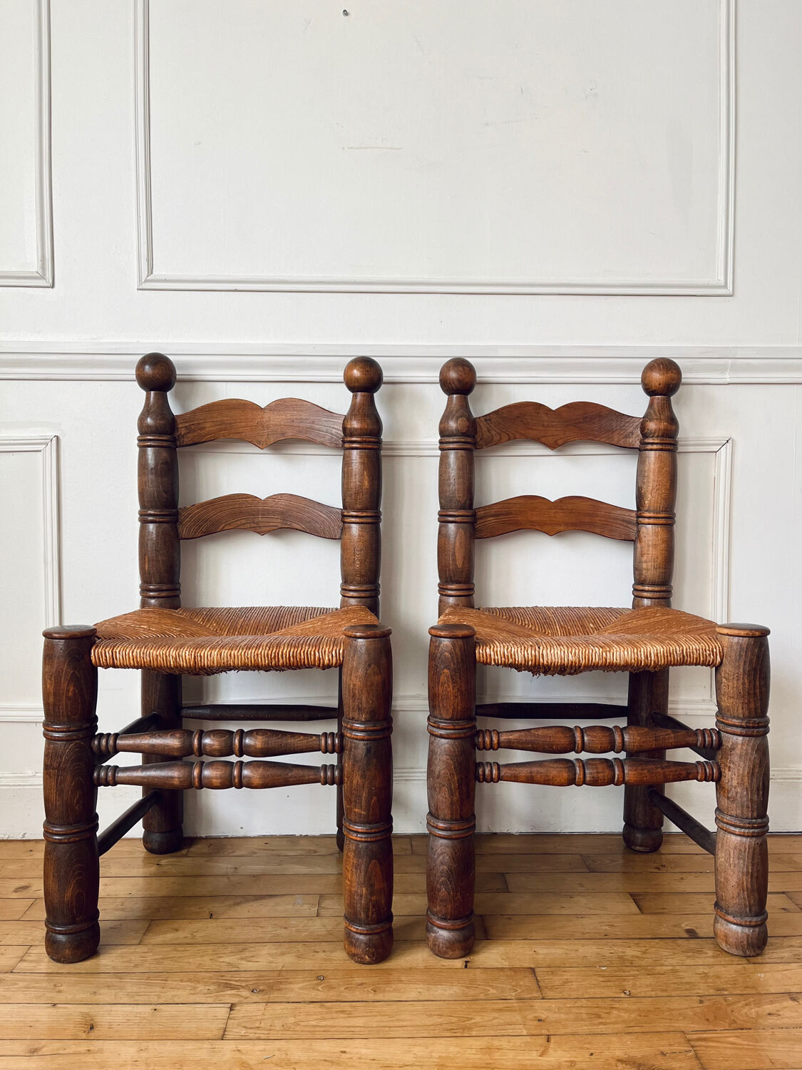 Pair of rustic chairs in the style of Charles Dudouyt.