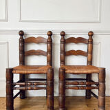 Pair of rustic chairs in the style of Charles Dudouyt.