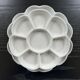 Paire de plats fleurs en porcelaine
