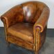 Vintage club armchair in leather color cognac Netherlands