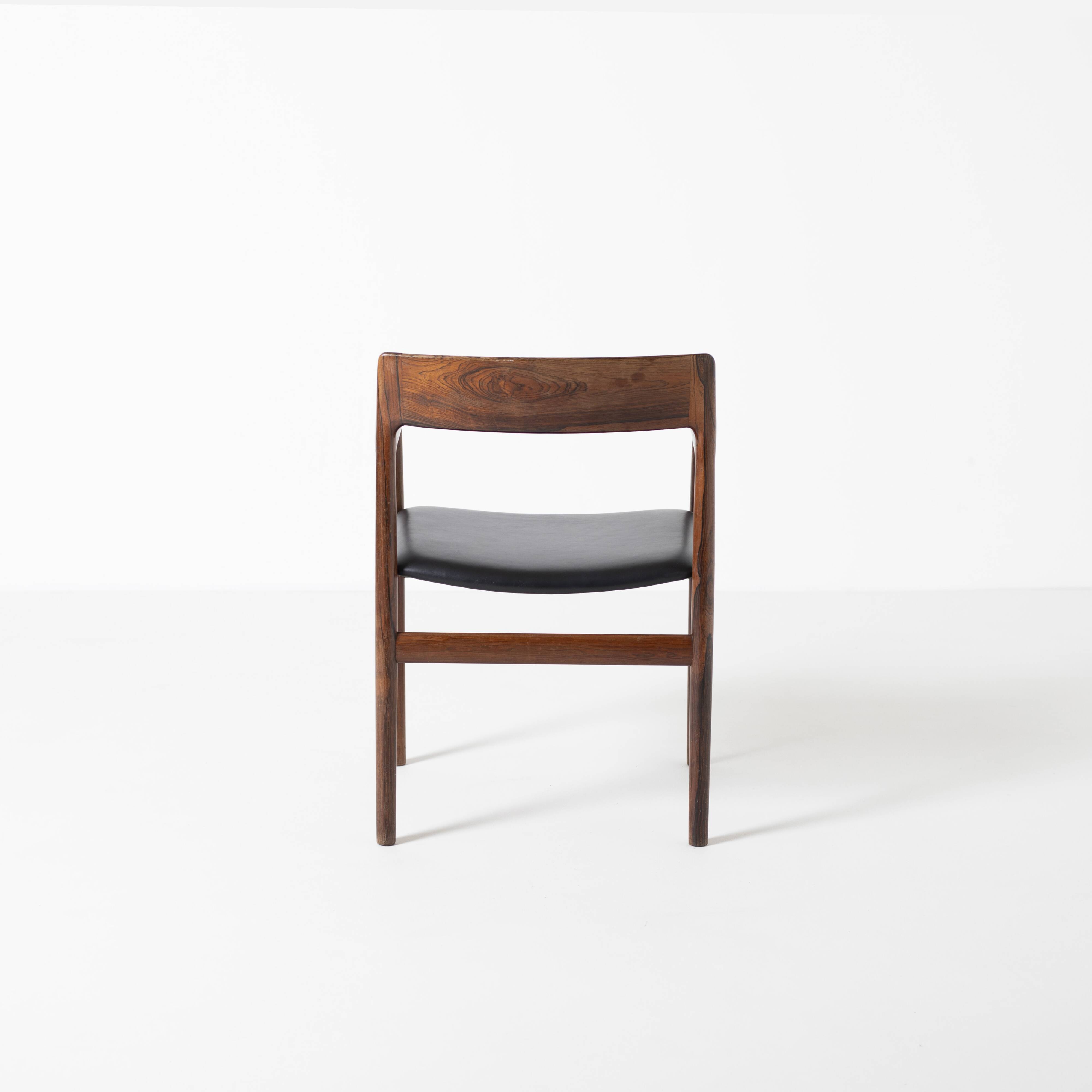 Armchair in rosewood and black leather, by J. Norgaard, Denmark, 1960s