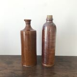 Pair of sandstone bottles