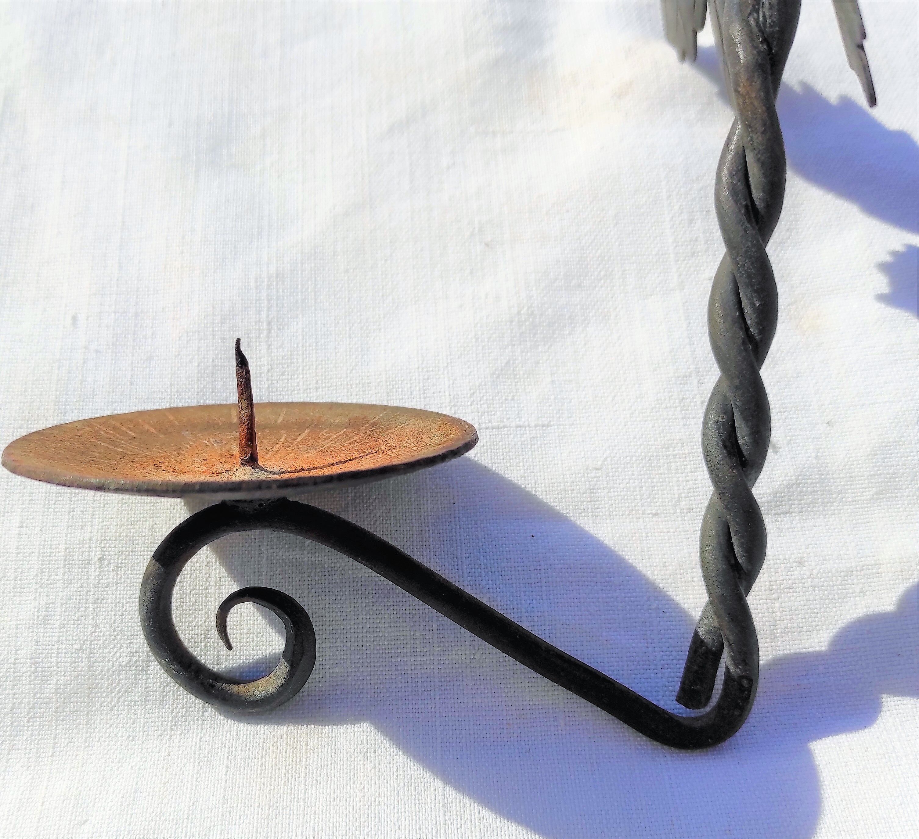 Wrought iron wall candle lamp with ancient vine leaves