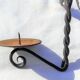 Wrought iron wall candle lamp with ancient vine leaves