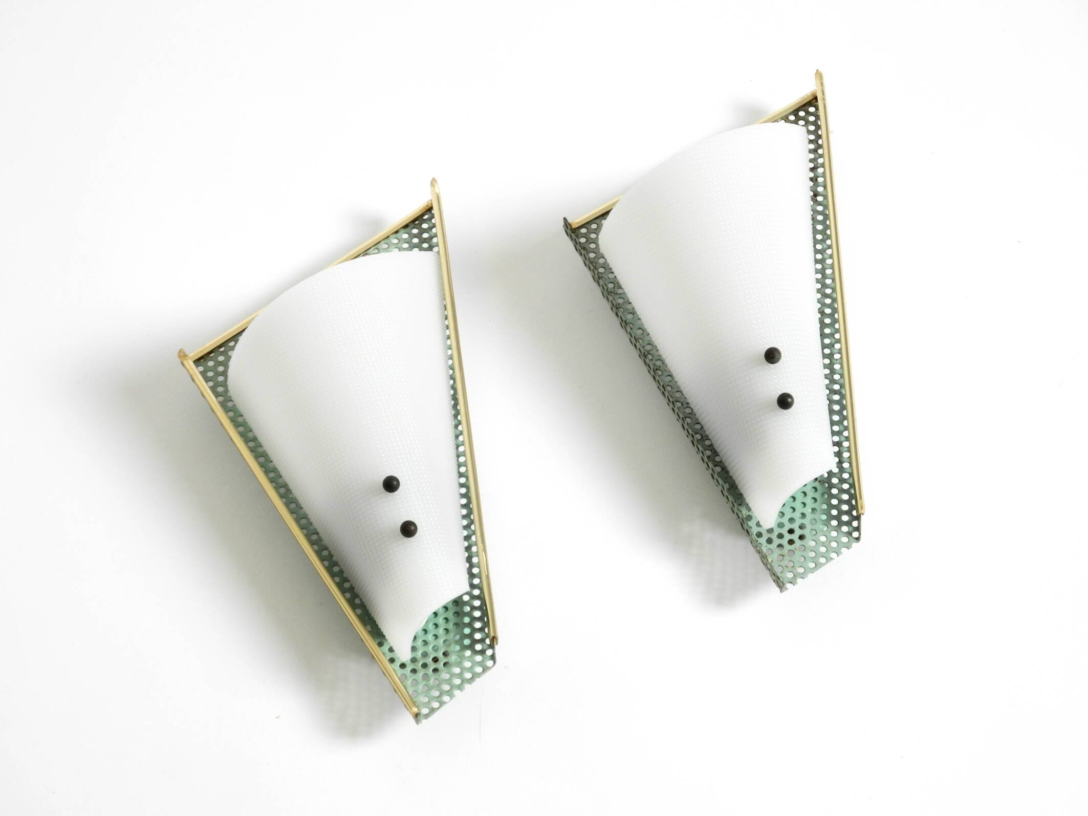 Pair of beautiful mint green Mid Century Modern perforated sheet metal wall