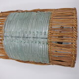 Glass and rattan sconce