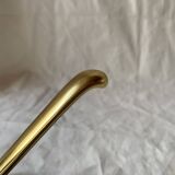 Vintage coat rack in lacquered metal with three golden aluminum hooks