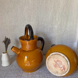 Enameled jugs signed Gomares