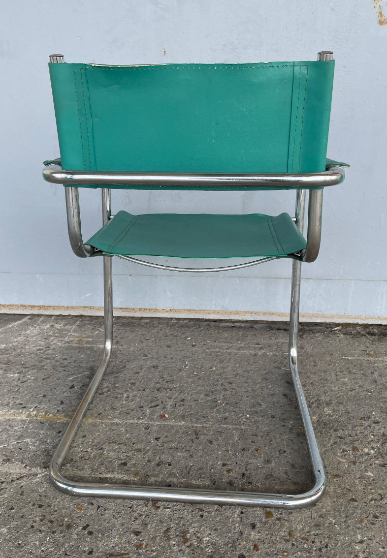 Green leather armchair