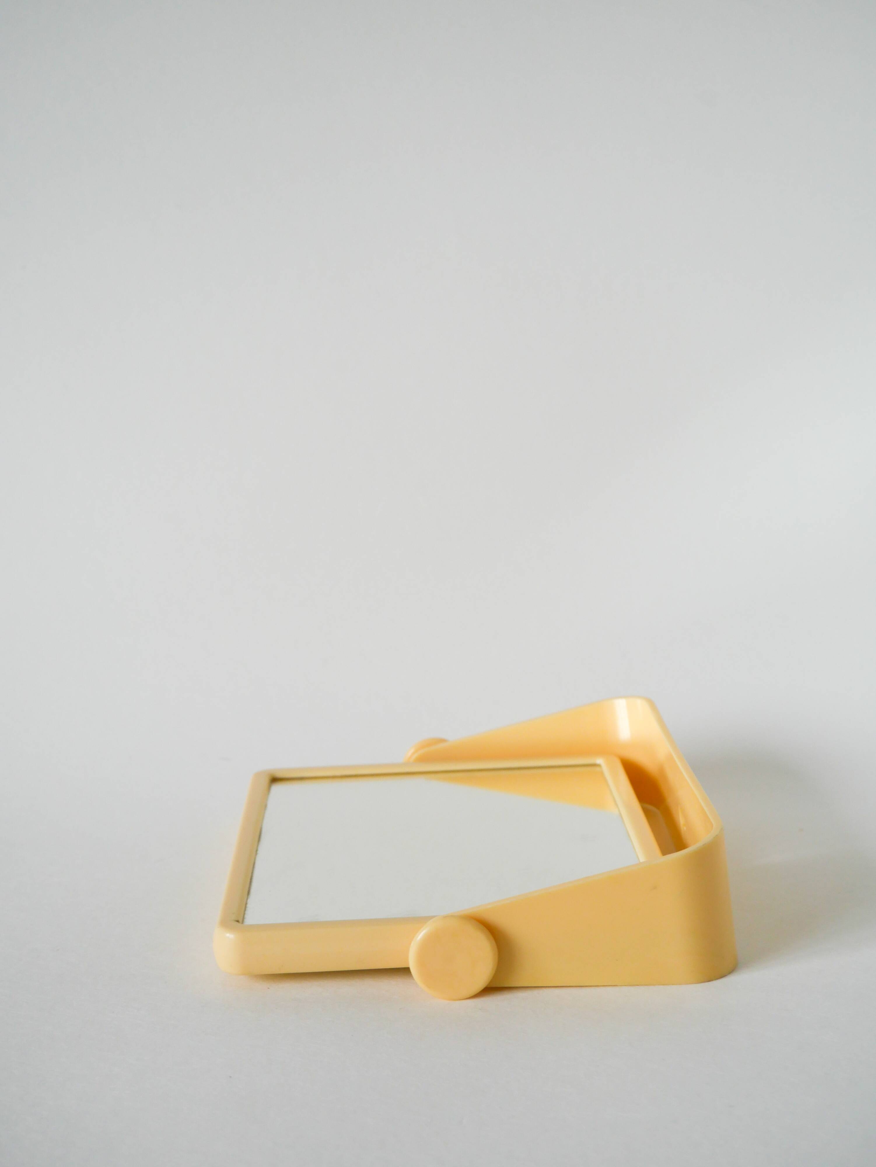 Small cream plastic bathroom mirror to attach, 1970s