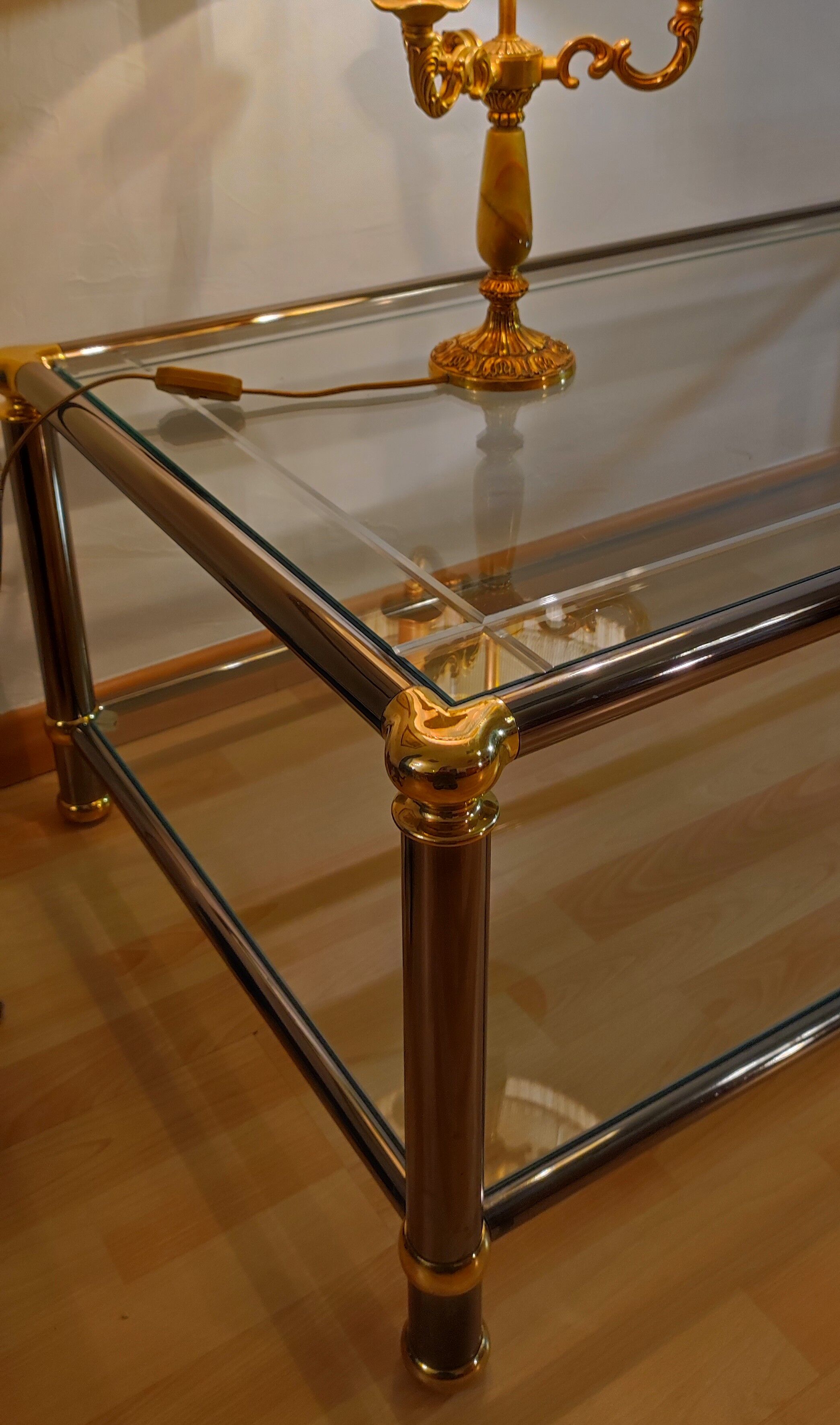 Hollywood regency gold metal & smoked silver coffee table, cut glass