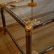 Hollywood regency gold metal & smoked silver coffee table, cut glass