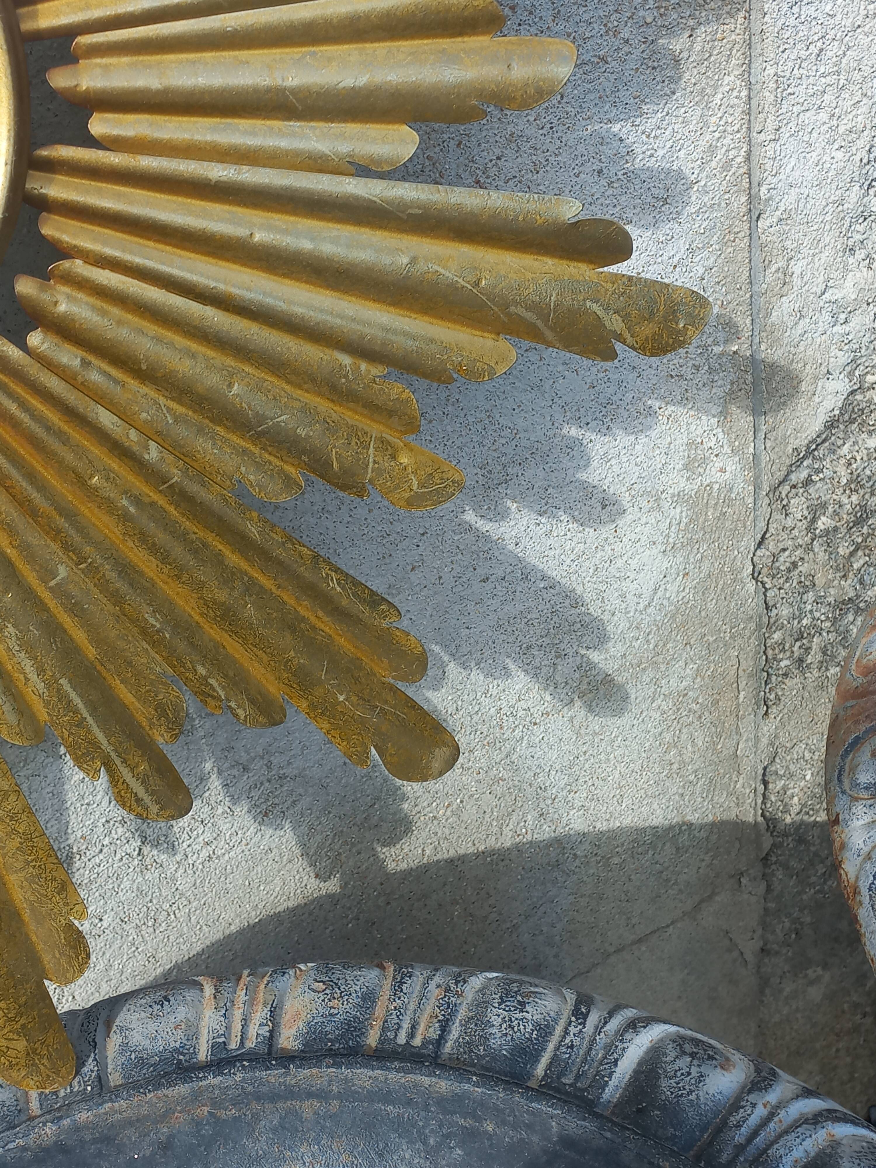 Gold metal sun mirror